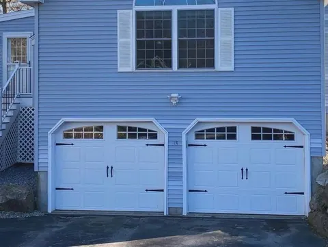 White replacement doors with arched windows in Marshfield