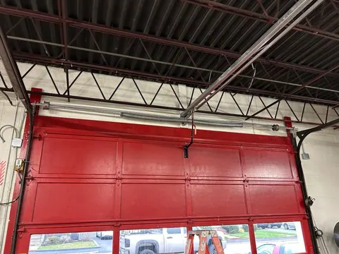 Torsion spring system above the body-shop door in Quincy